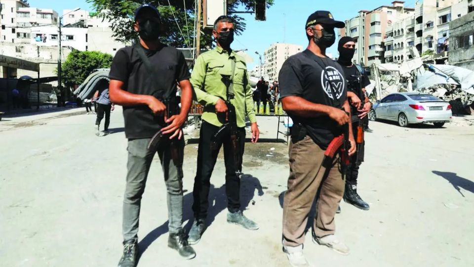 Hamas police officers patrol a street in Gaza City (Reuters) 